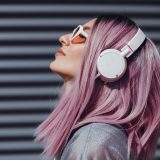 Beautiful,Young,Girl,With,Purple,Pink,Hair,Listening,To,Music